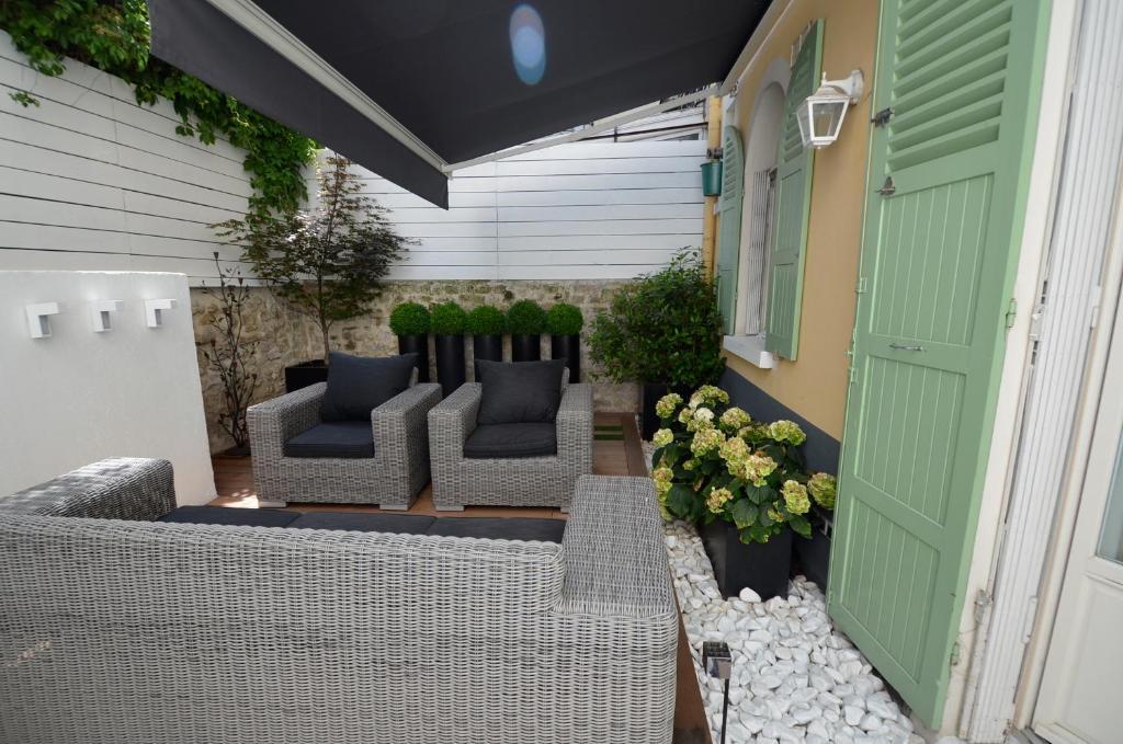 Le Jardin De Rochegrosse Acomodação com café da manhã Paris Exterior foto